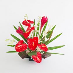 red anthurium and ginger with white orchids