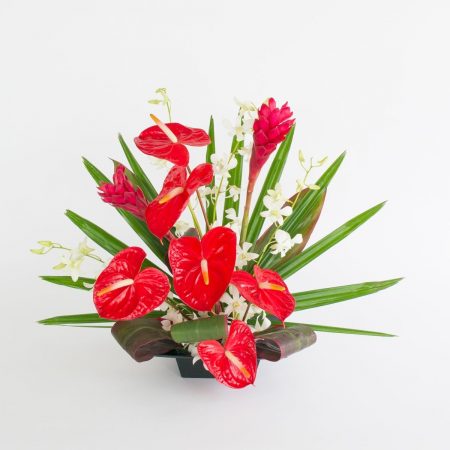 red anthurium and ginger with white orchids